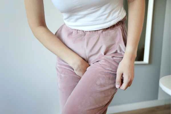 woman struggling with urine incontinence Malvern Wells